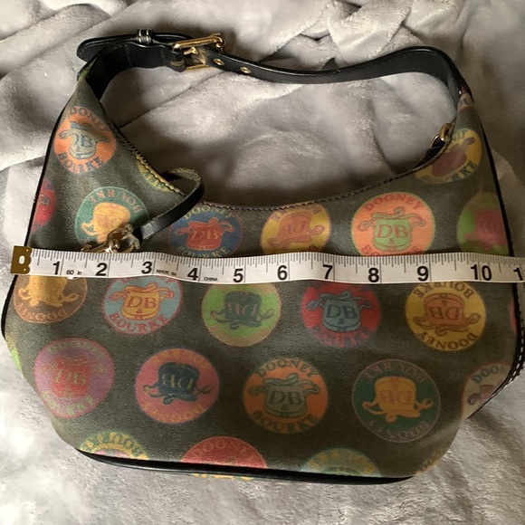 Authentic Dooney and Bourke wax coated handbag with adjustable leather strap - Picture 11 of 16